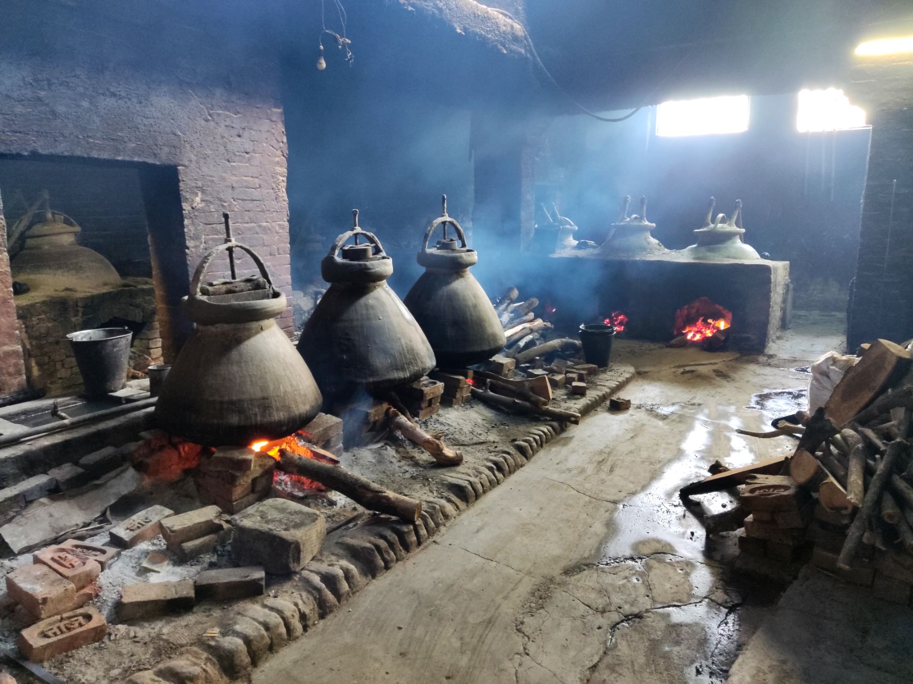 Smoke and wood fires in a traditional still house